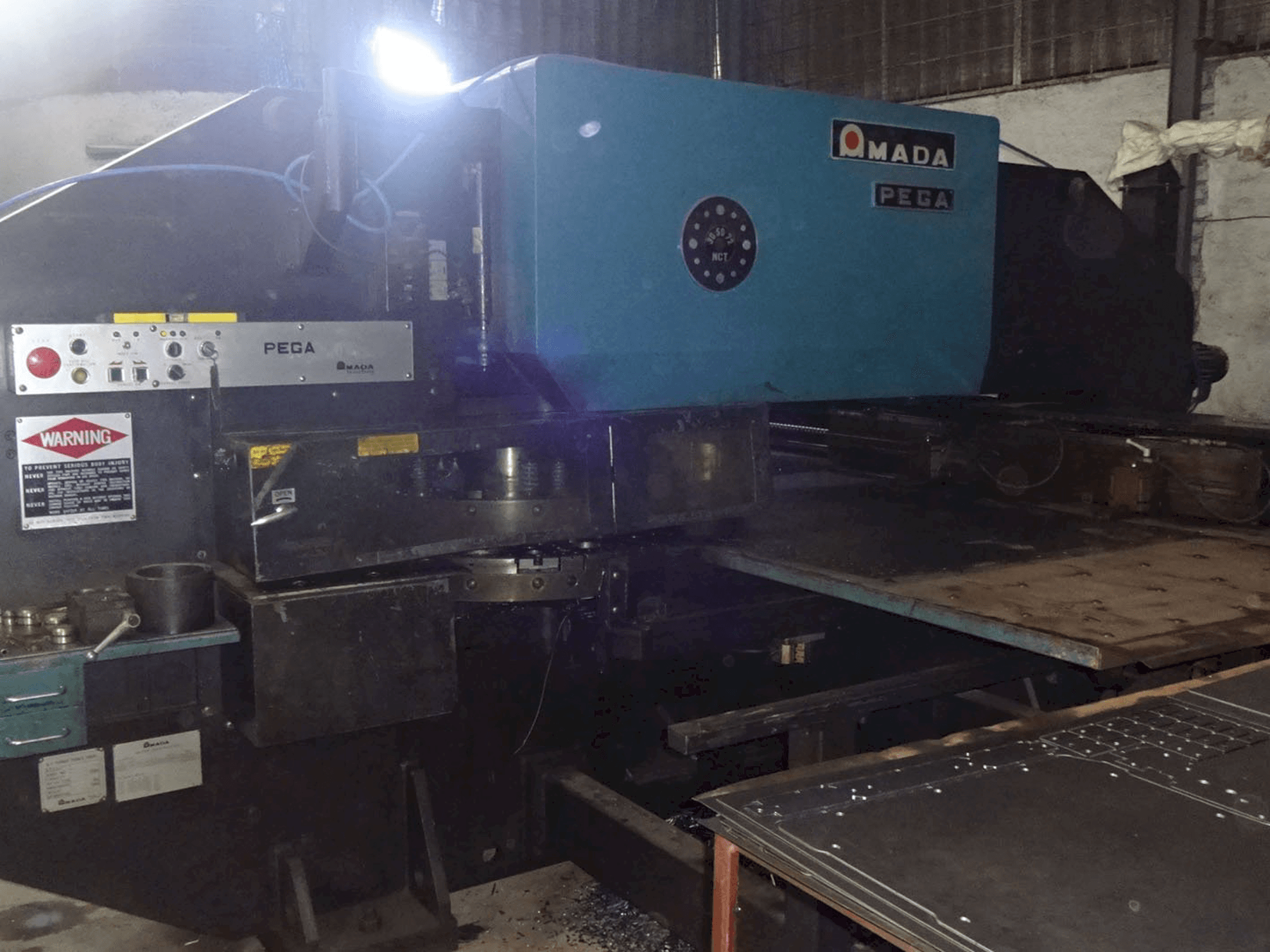 Left view of AMADA PEGA 305072 Machine