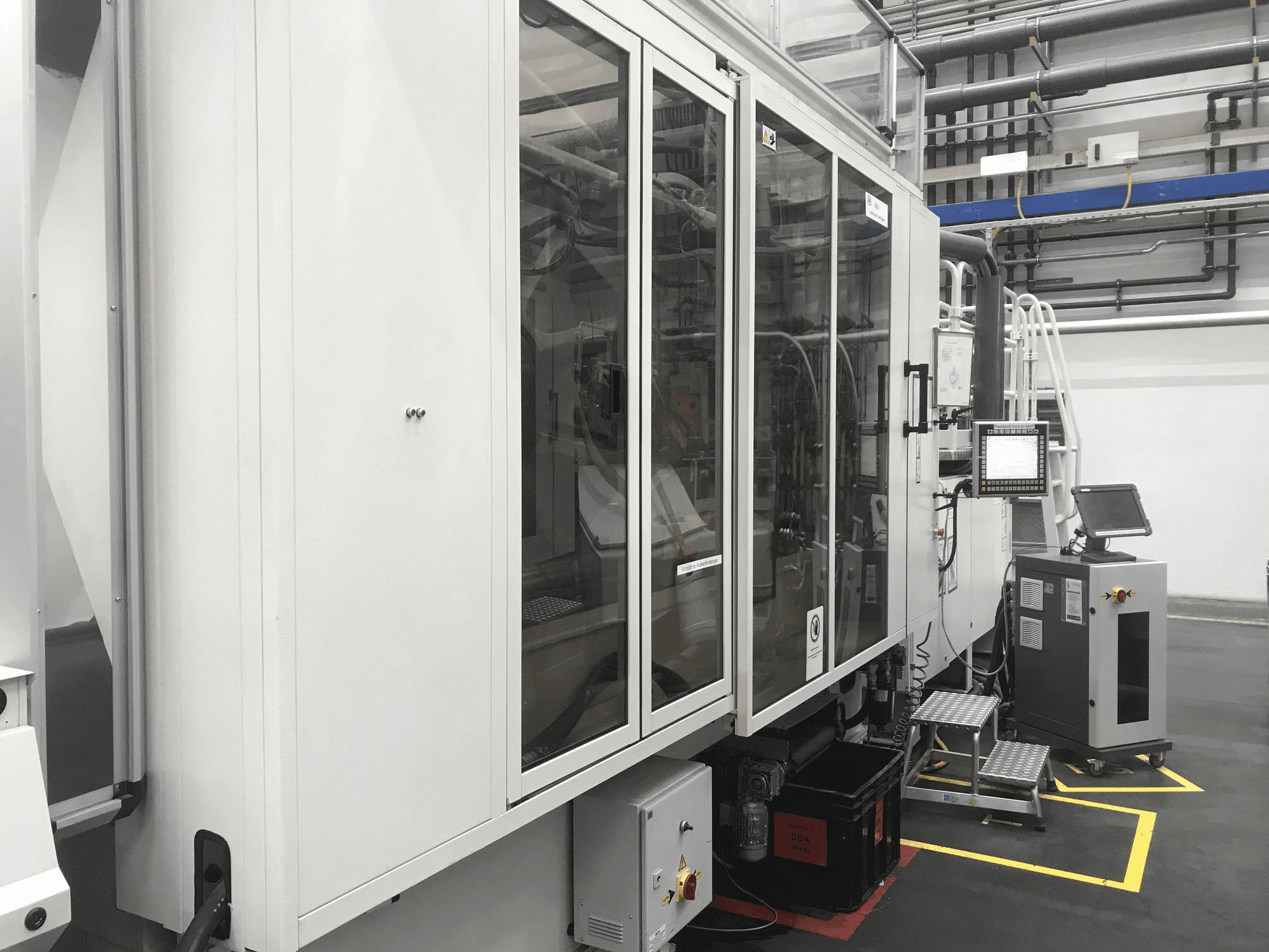 Left side view of Husky H500 RS 65/60 machine