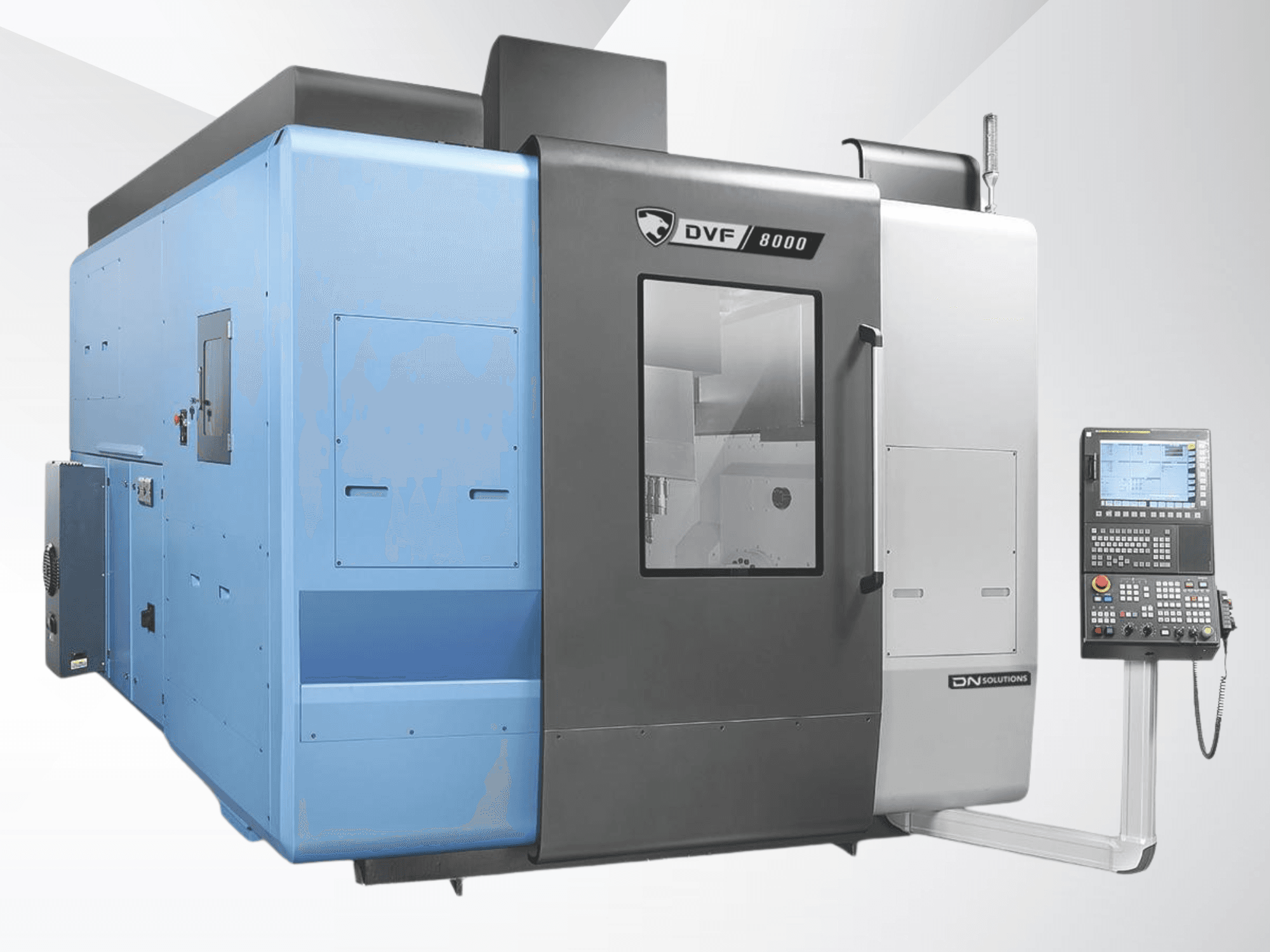Універсальний обробний центр DN SOLUTIONS DVF 8000, вид спереду, на якому видно панель управління та двоколірне зовнішнє оформлення.