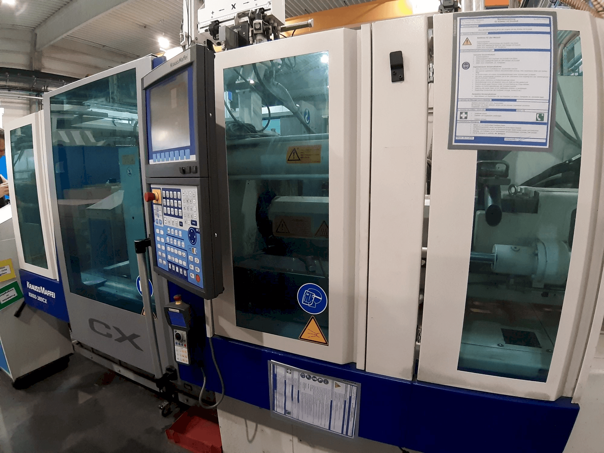 Front view of Krauss Maffei 80 - 380 CX machine