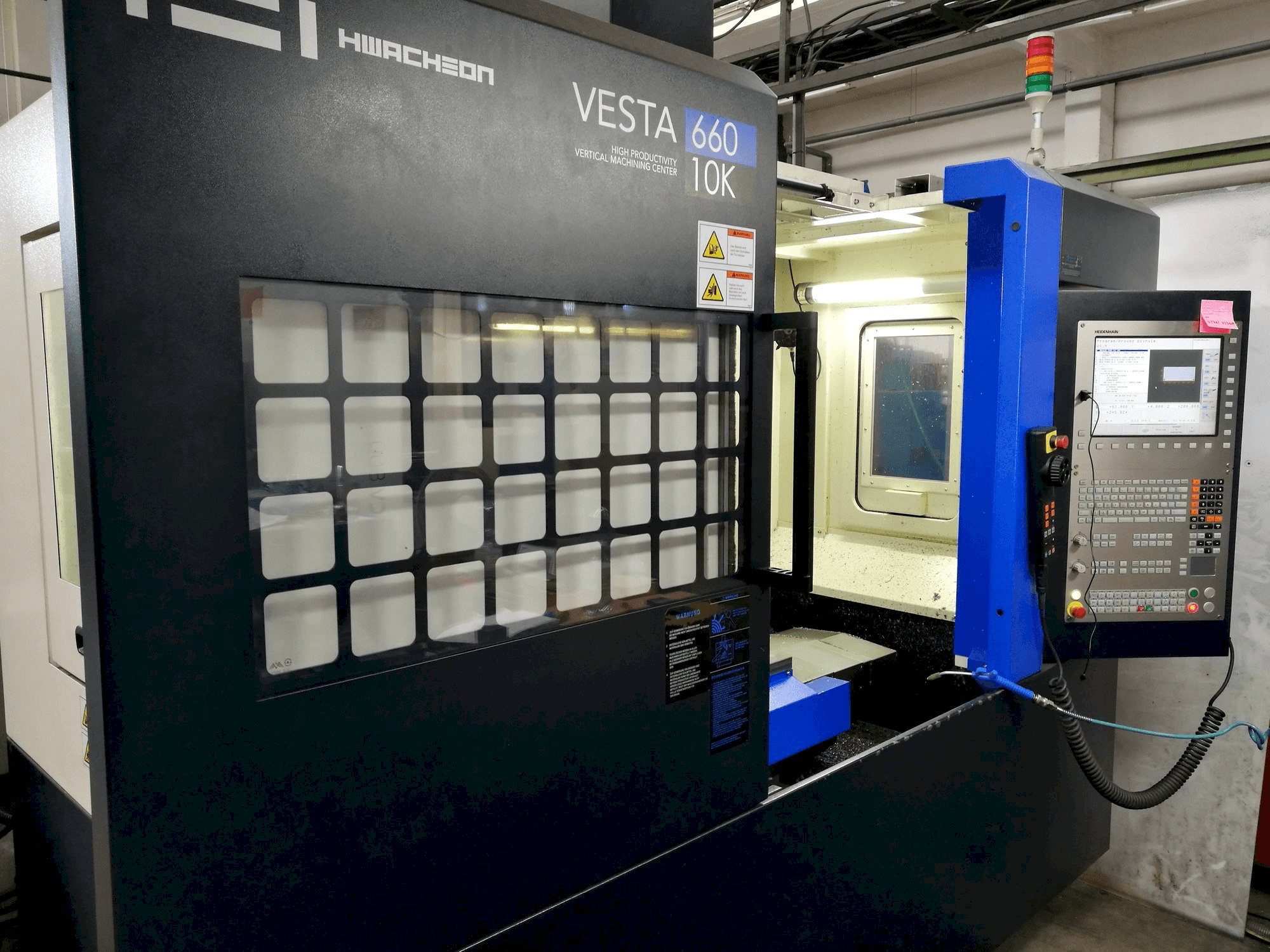 Front view of HWACHEON Vesta-600 machine