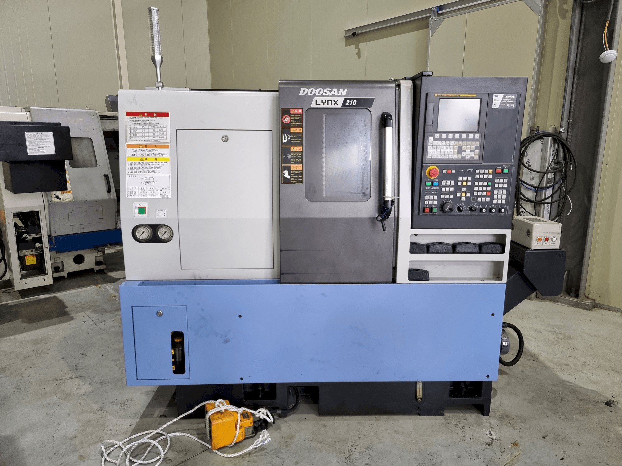 Front view of Doosan LYNX 210 machine