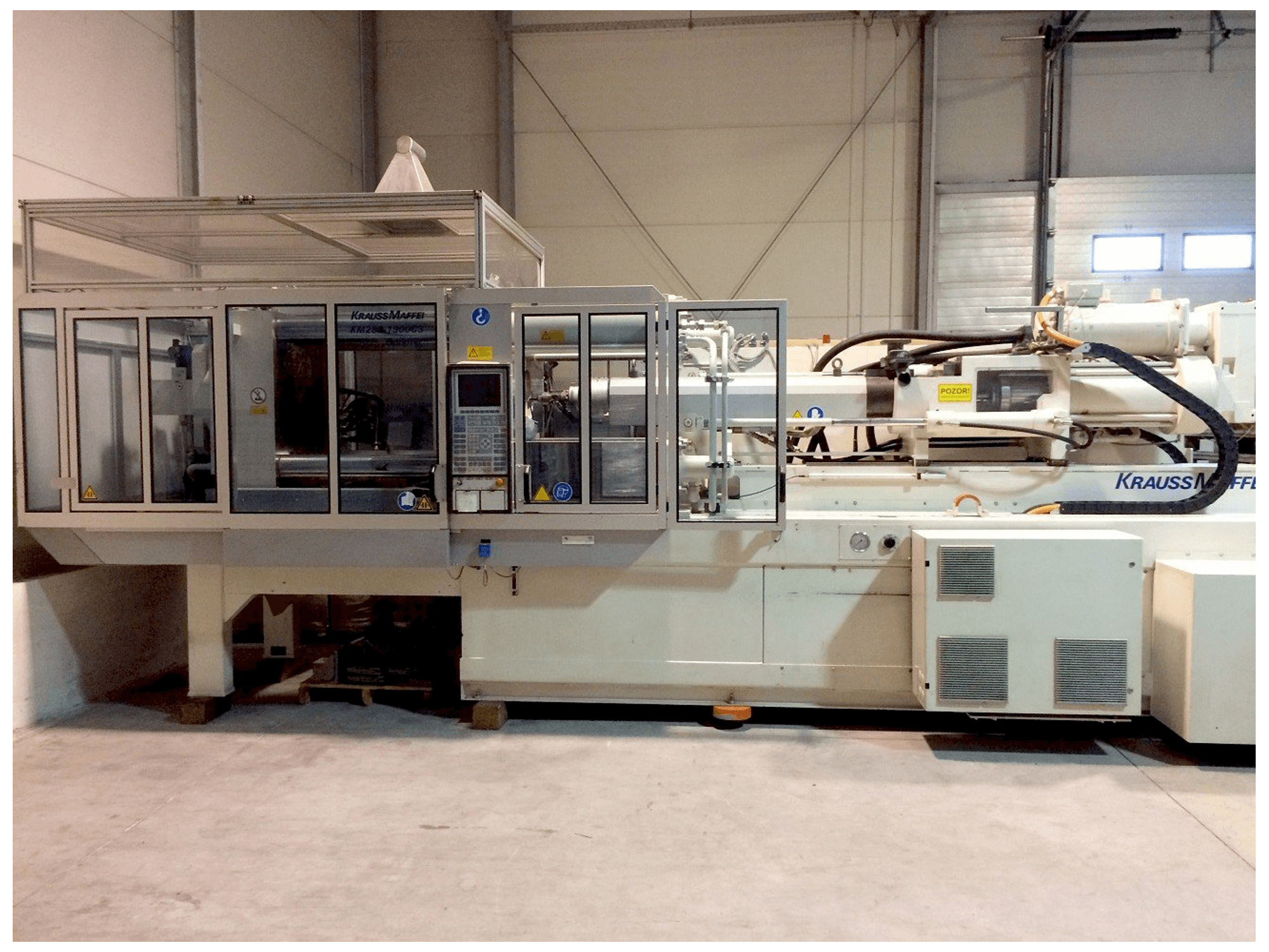 Front view of Krauss Maffei KM 280-1900 C3 machine