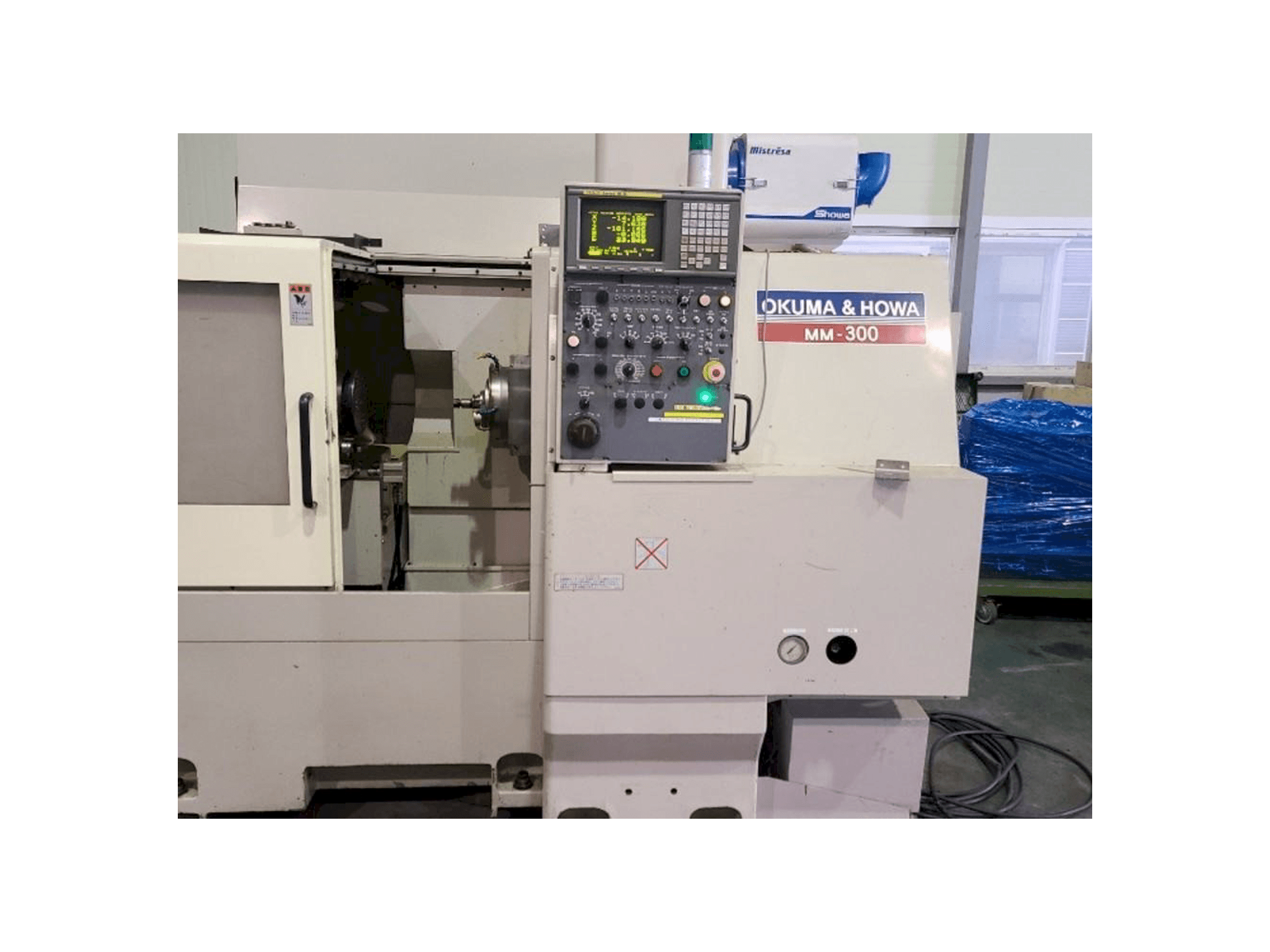 Front view of OKUMA&HOWA MM-300 machine