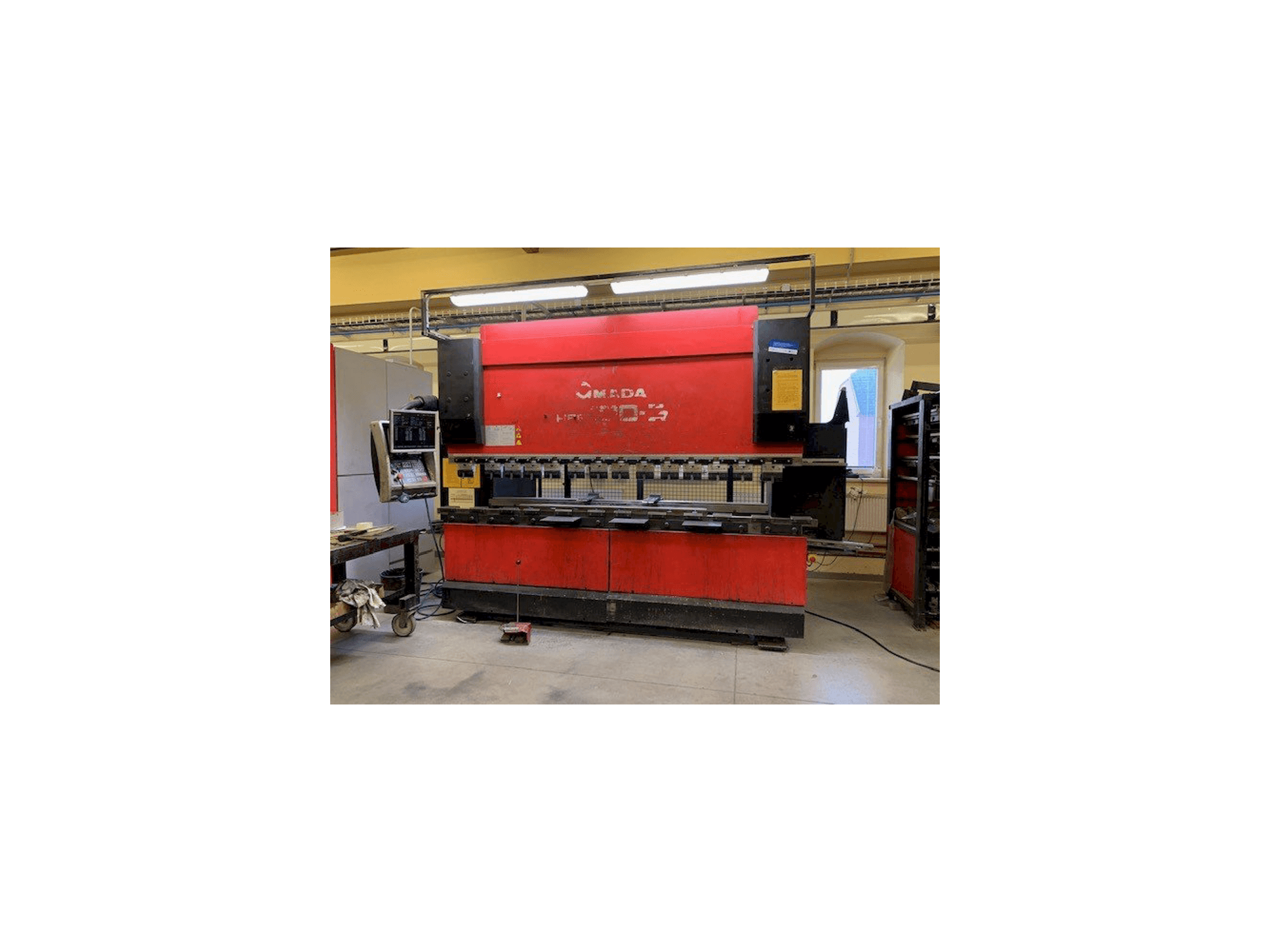 Front view of AMADA HFE 100-3 machine