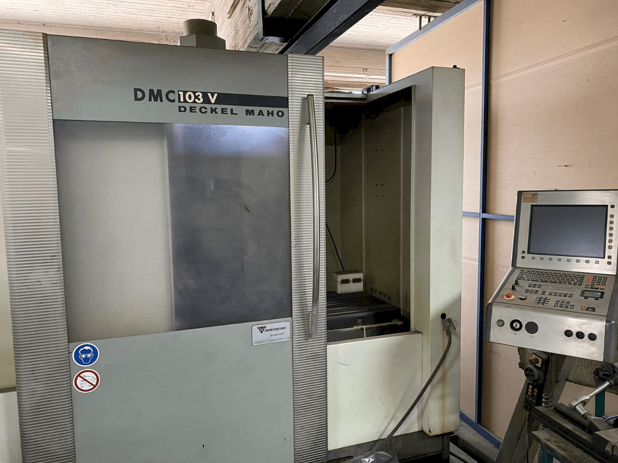 Front view of DECKEL MAHO DMC 103 V machine