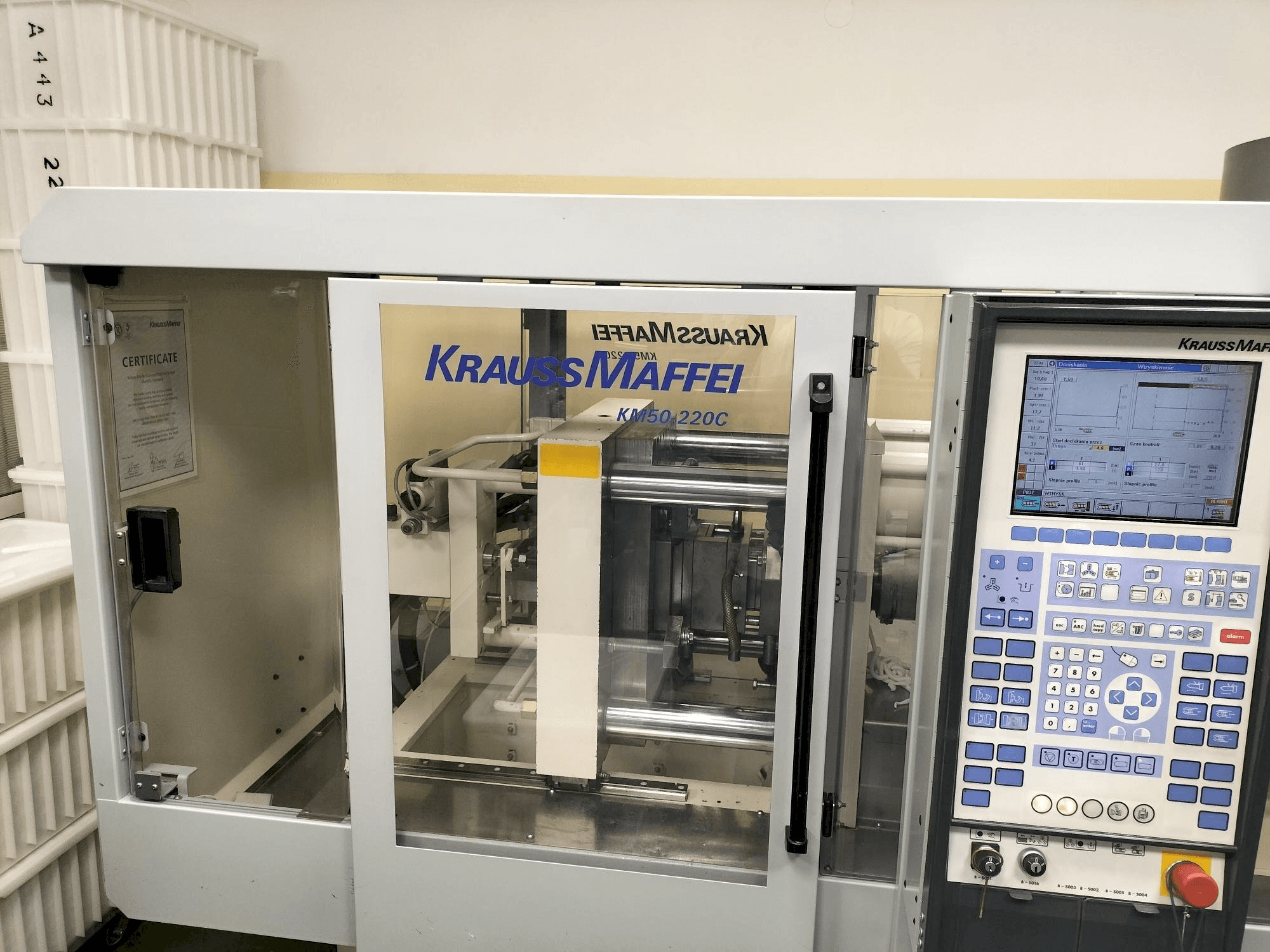 Front view of Krauss Maffei KM 50-220C Win machine