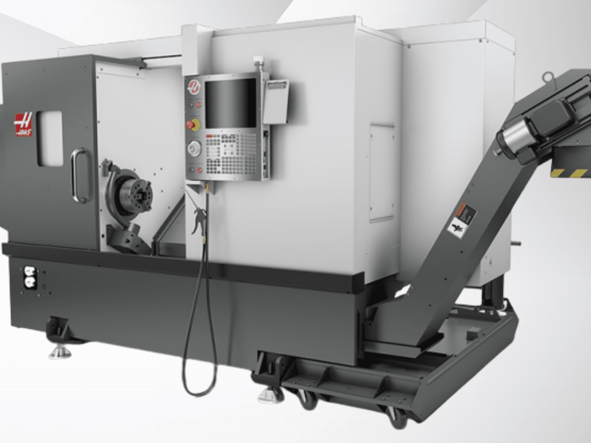 Горизонтальний токарний верстат Haas ST-20; вид спереду, на якому видно панель керування, шпиндель та конструкцію конвеєра для відходів.