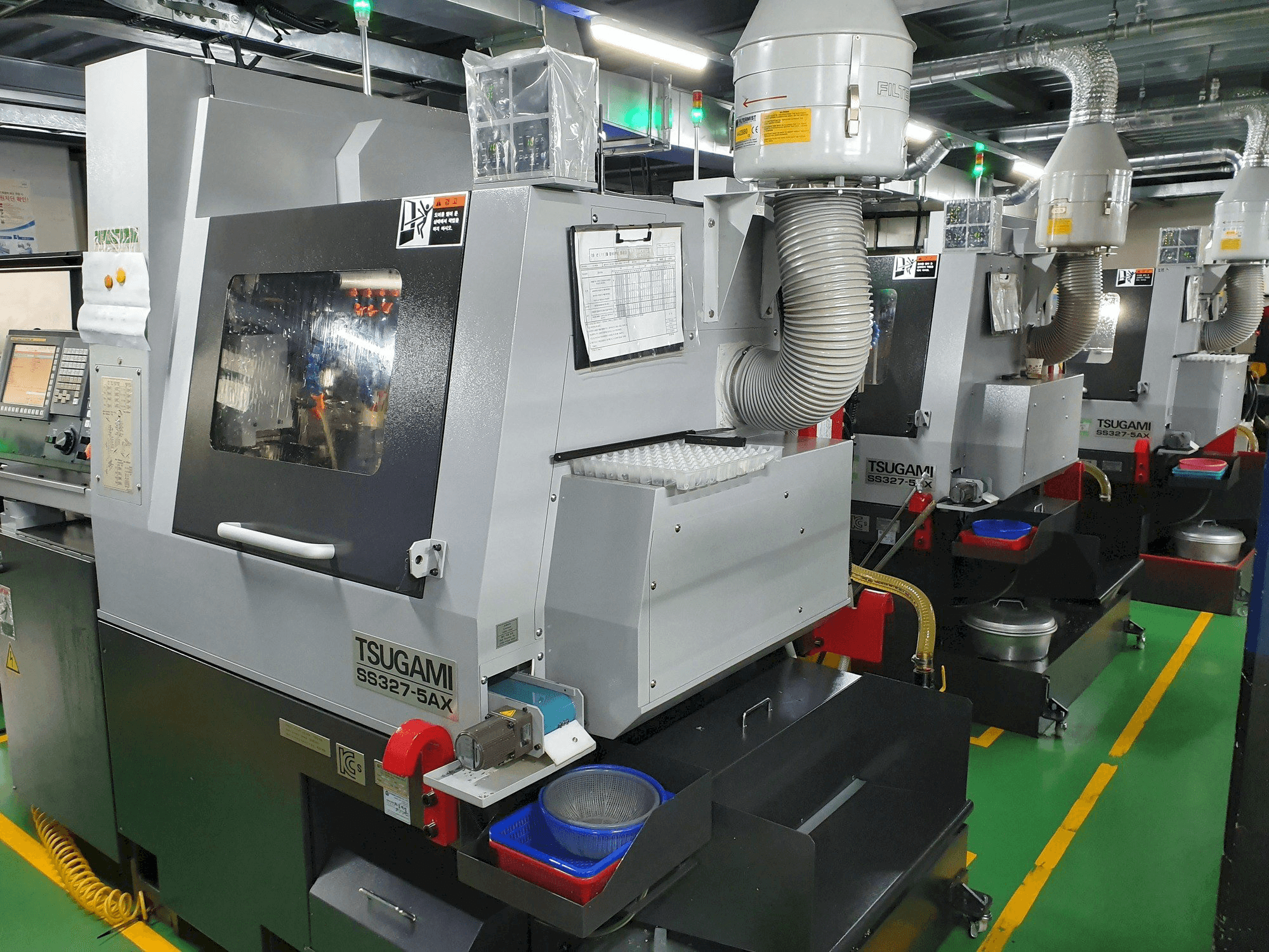 Front view of TSUGAMI SS327-5AX machine