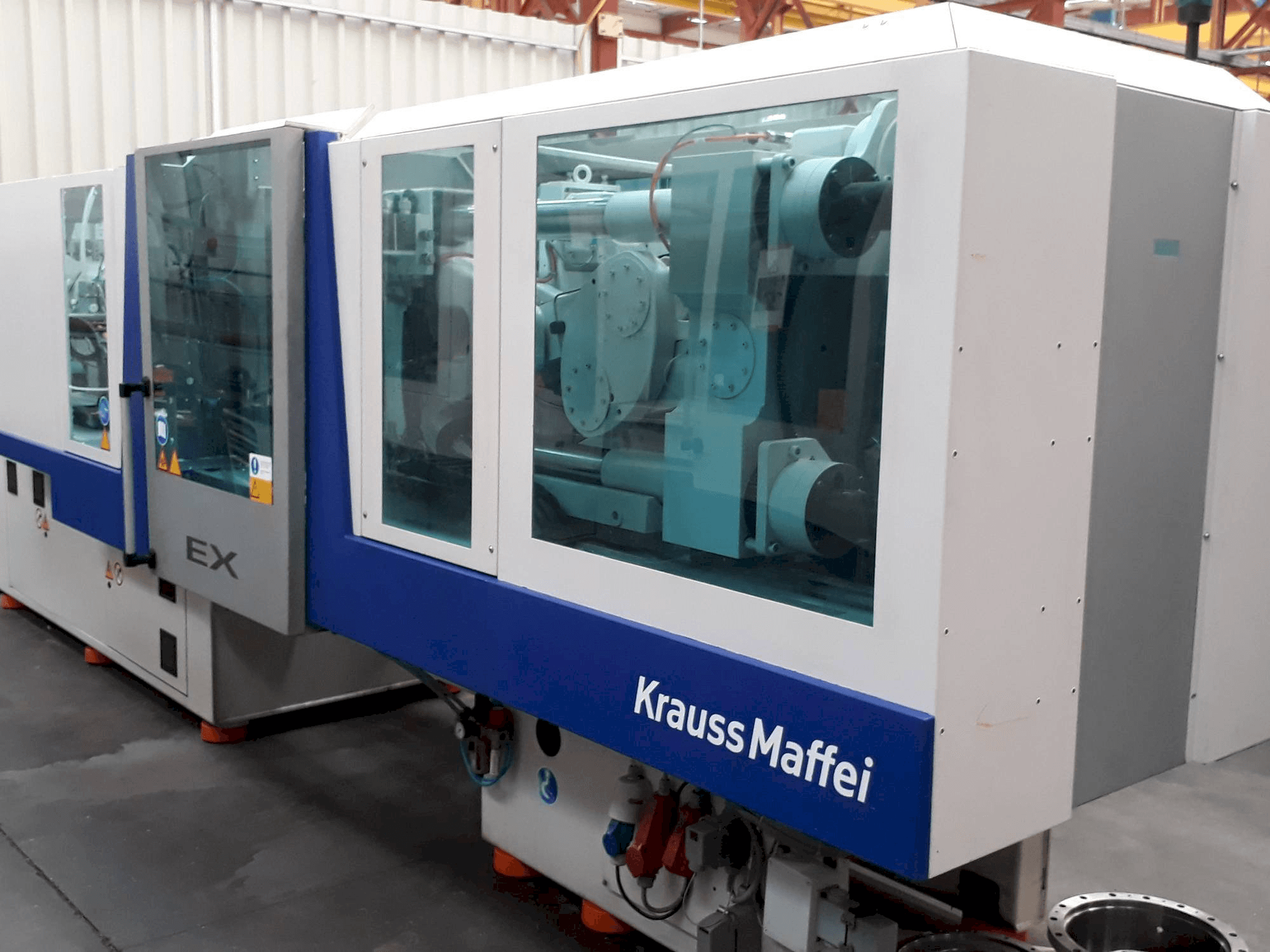 Front view of Krauss Maffei 160-750 EX machine
